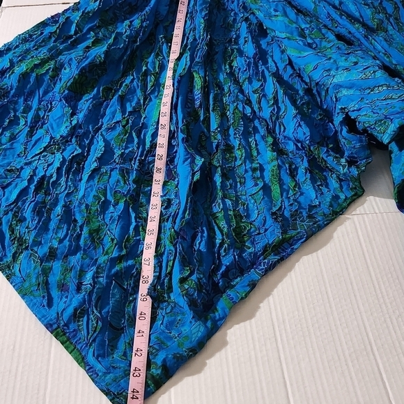 Women's Blue Textured Asymmetrical Wide Leg Shoulder Tie Pockets Jumpsuit Romper - Picture 12 of 14